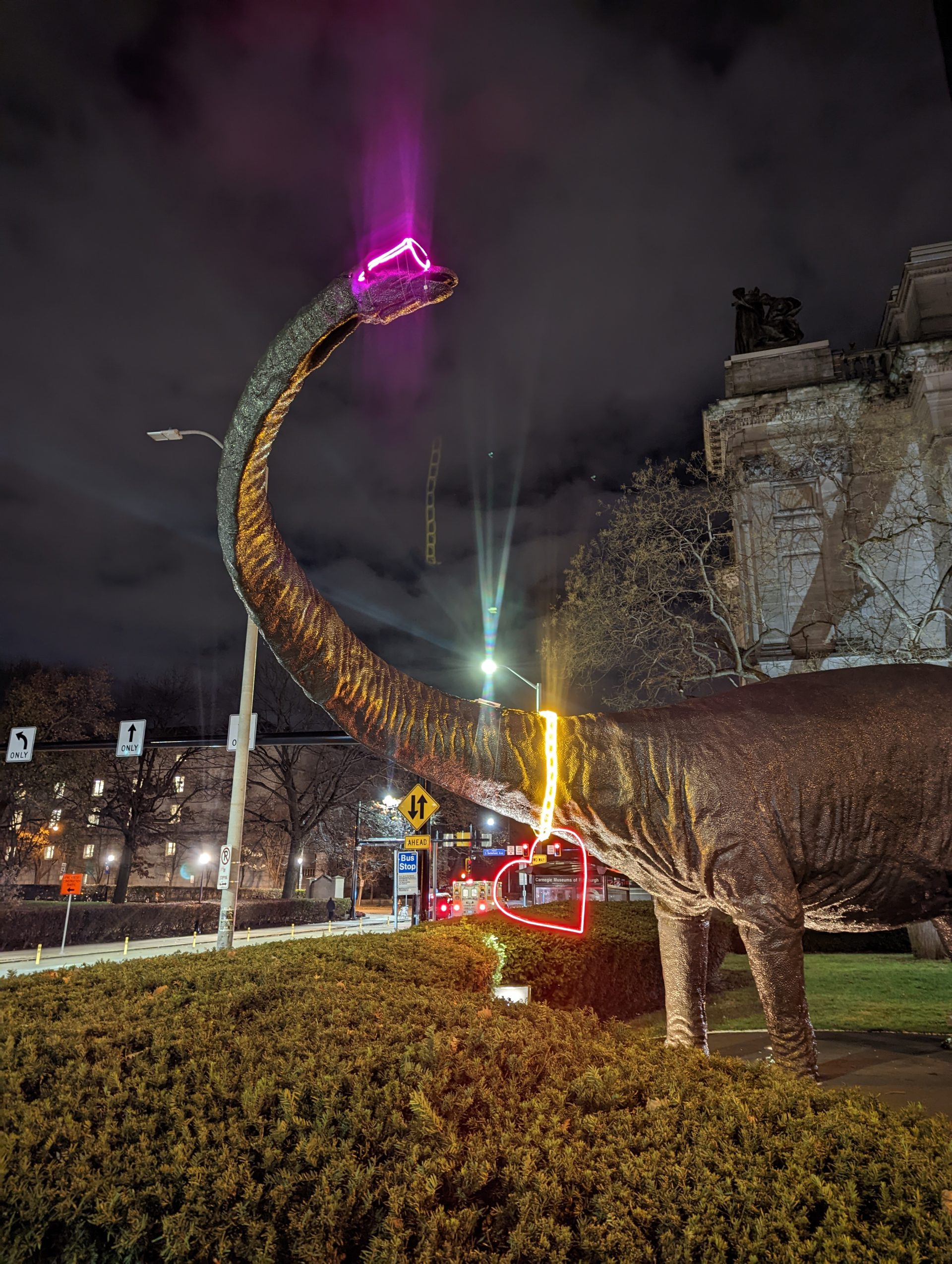 dippy the dinosaur pittsburgh oakland with neon pink glasses